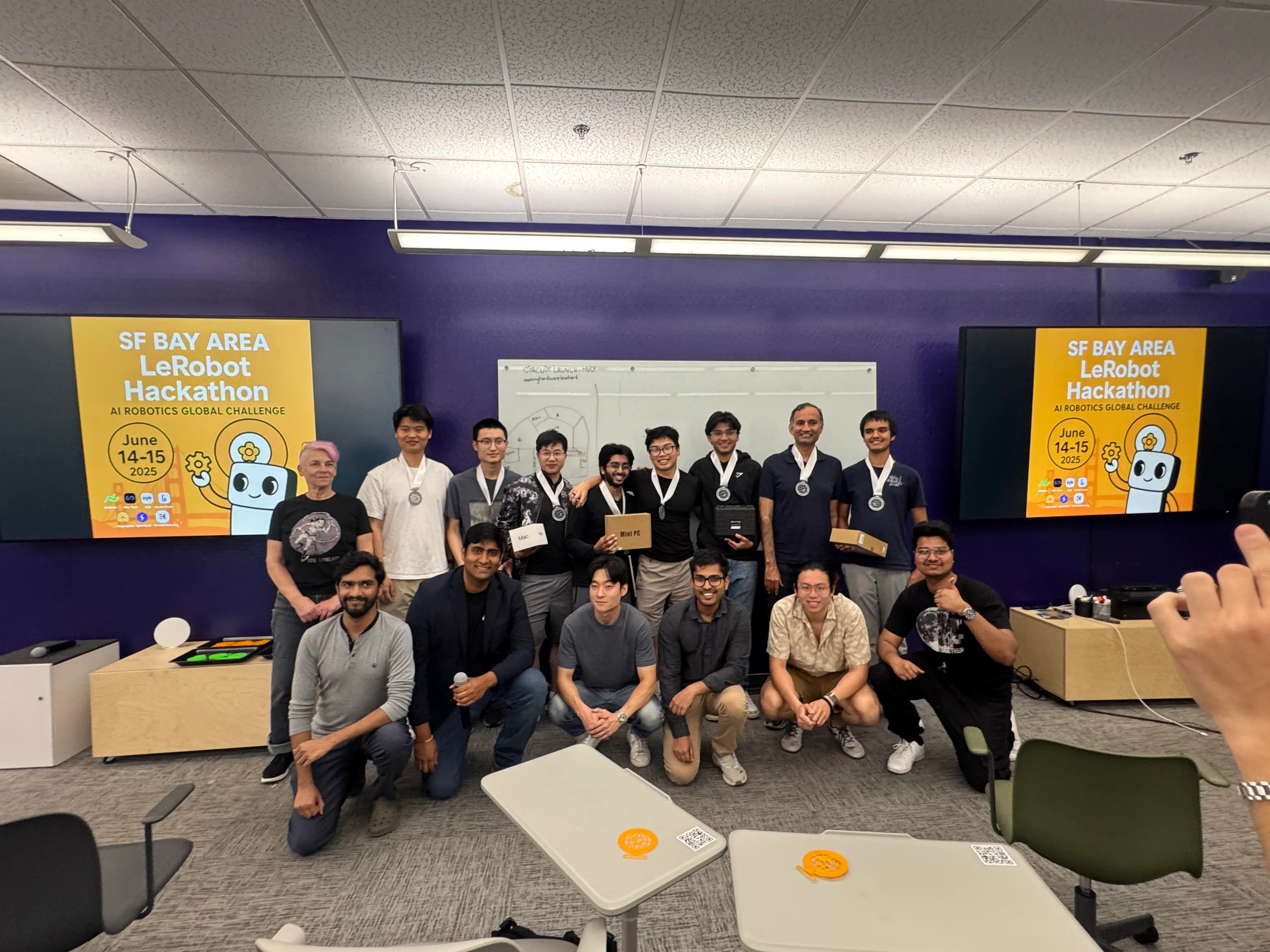 Winning team with LeRobot Hackathon judges and organizers